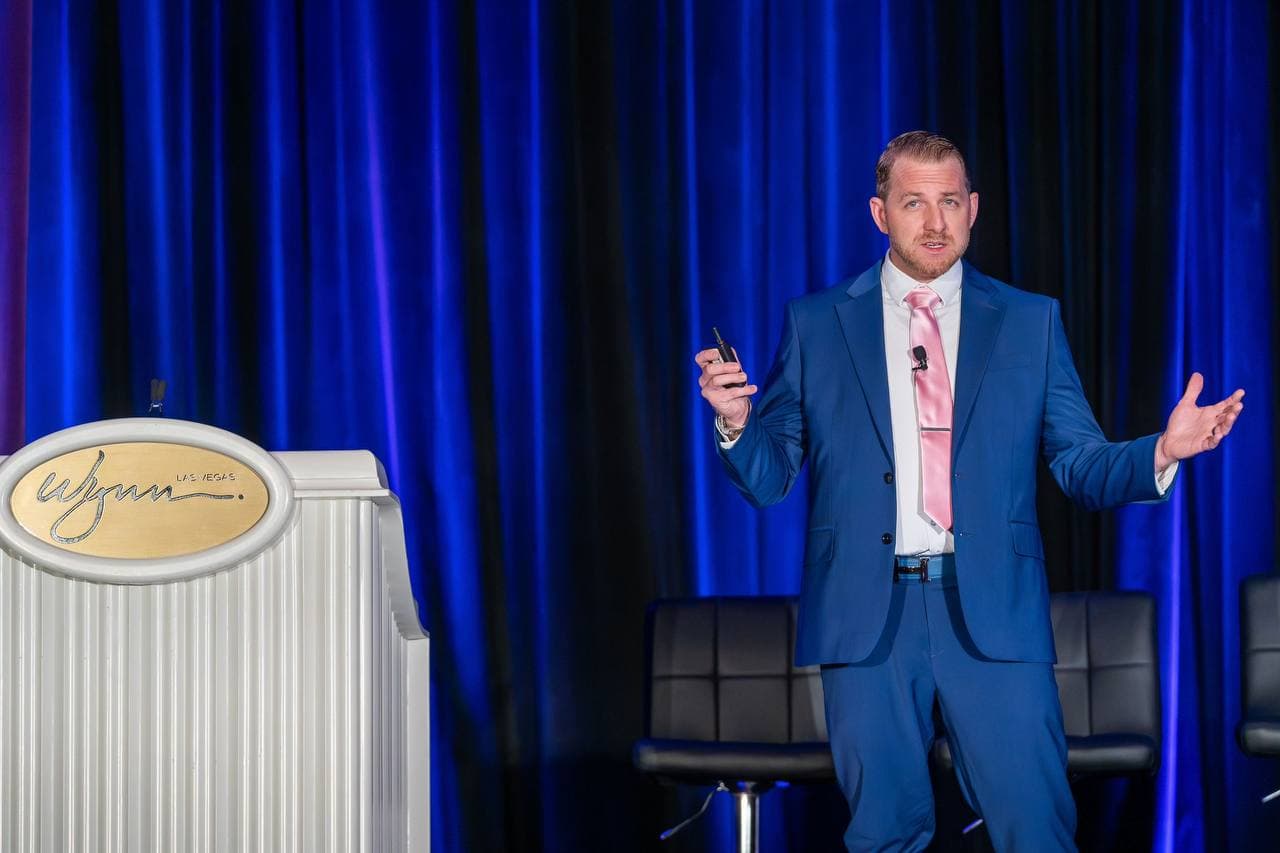 Dr. Jesse Morse speaking on stage